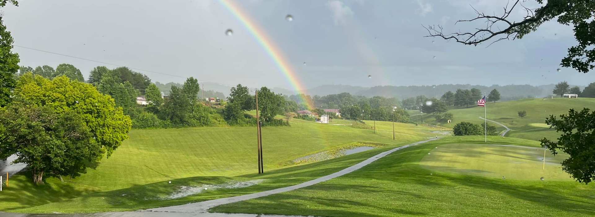 rainbow over golf course